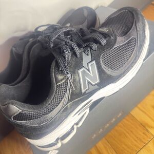 New Balance Black and White Sneakers with Mesh Upper